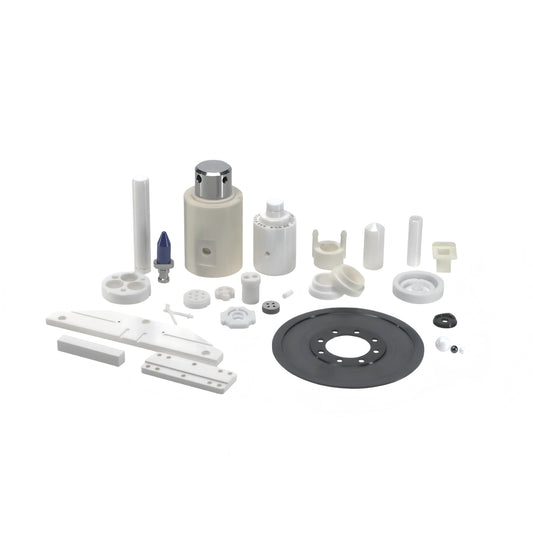 Comparison of zirconia and alumina precision ceramic components – showing color difference, material properties, and typical applications in industrial machinery, medical devices, and electrical insulation. For research use only.
