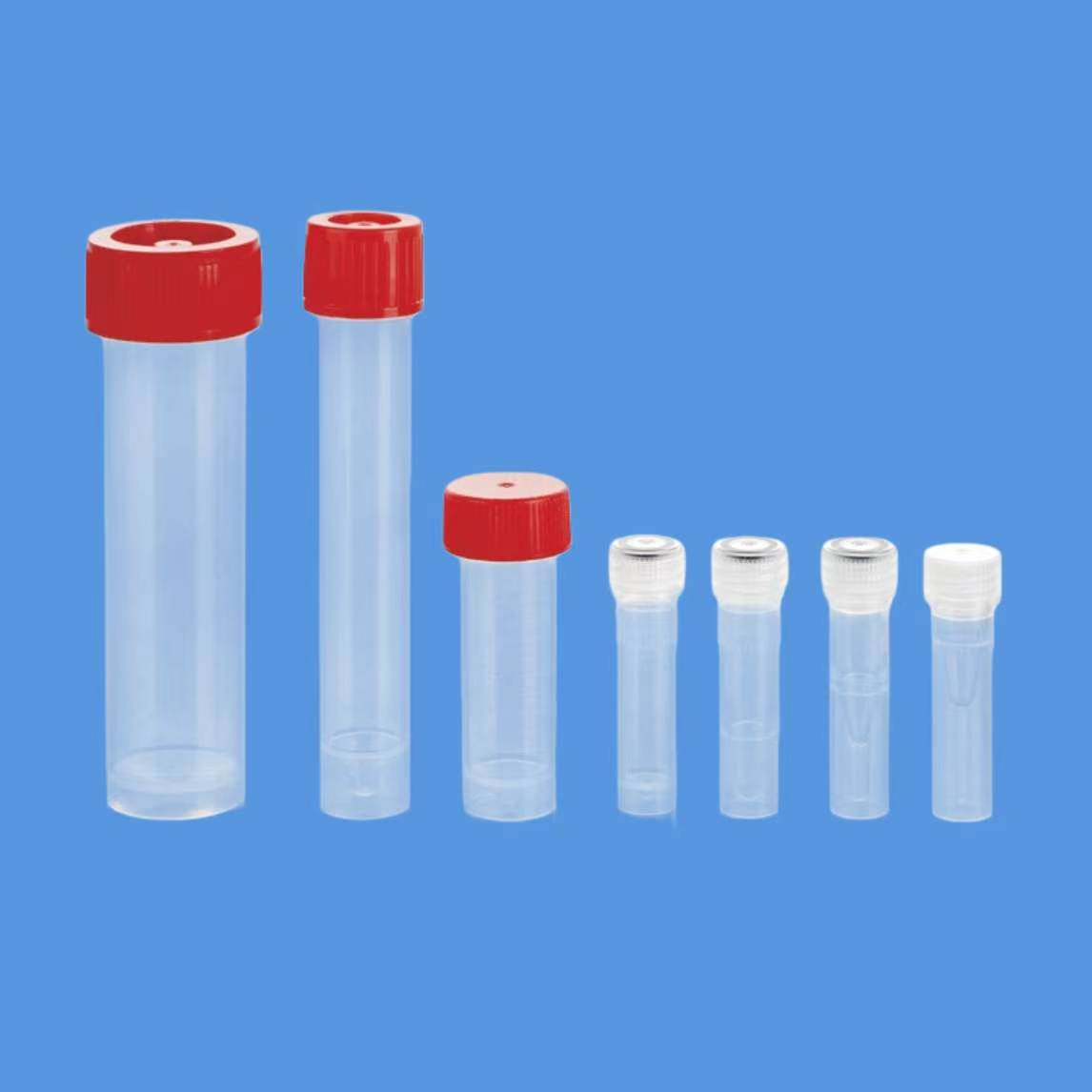 Small centrifuge tubes with red caps for laboratory sample processing and transport